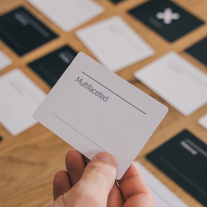 Someone holding a card during a brand creation workshop